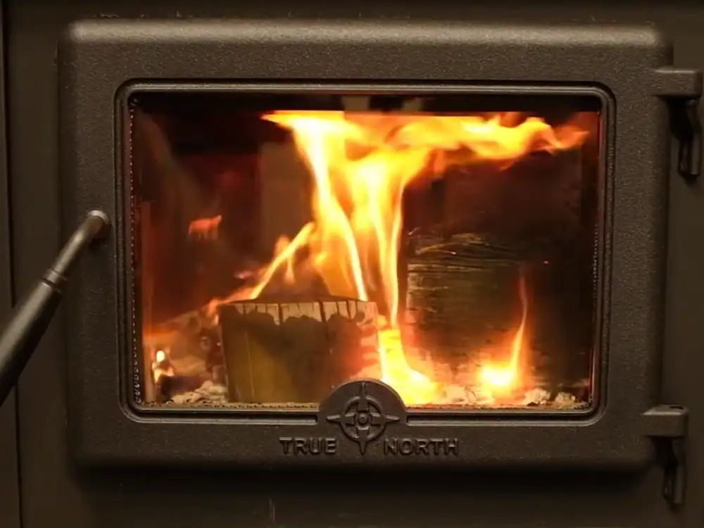 Wood stove firebrick showing clean burning heat output